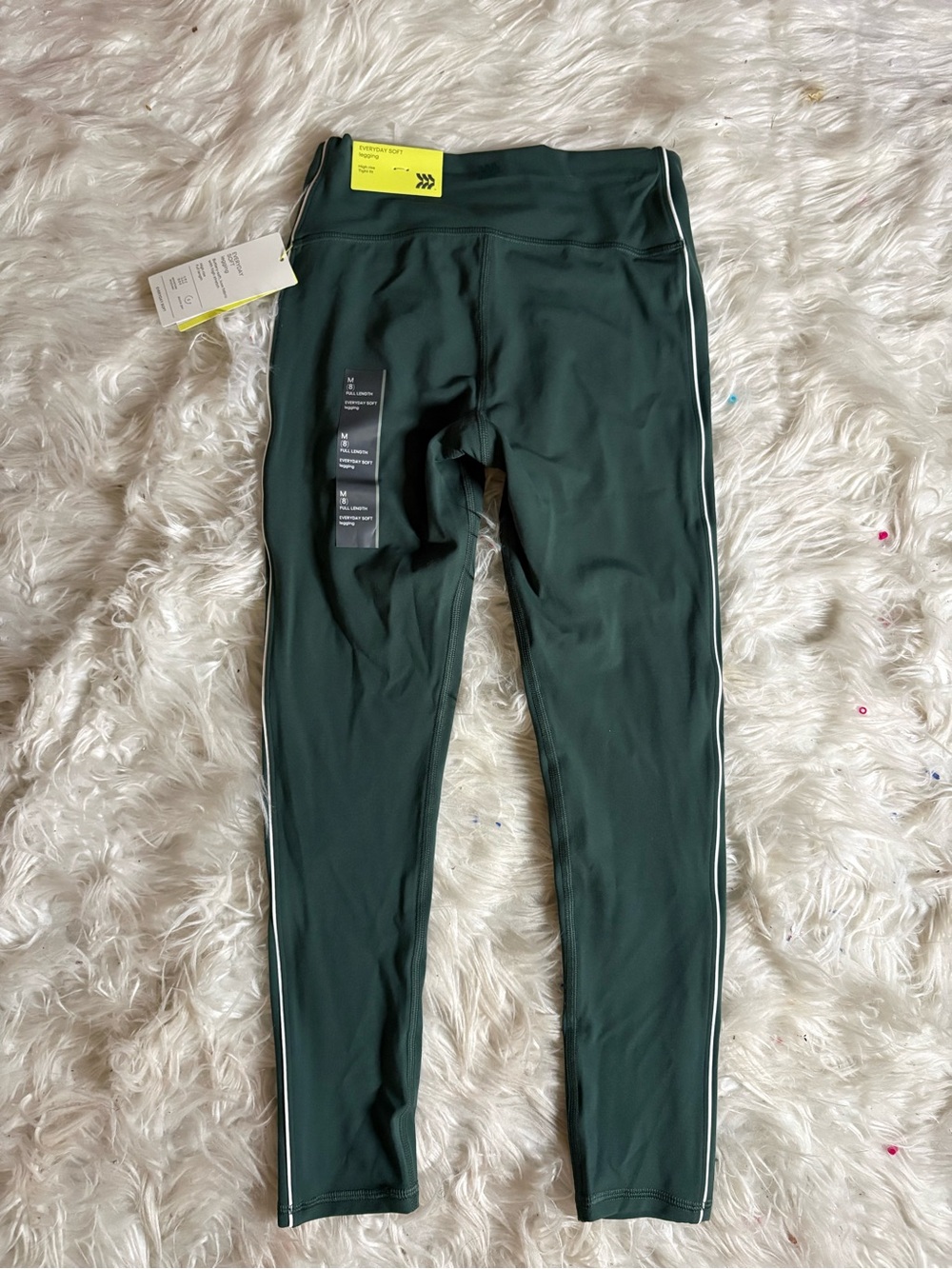 all in motion Dark Green Girls' Leggings with White Side strip.